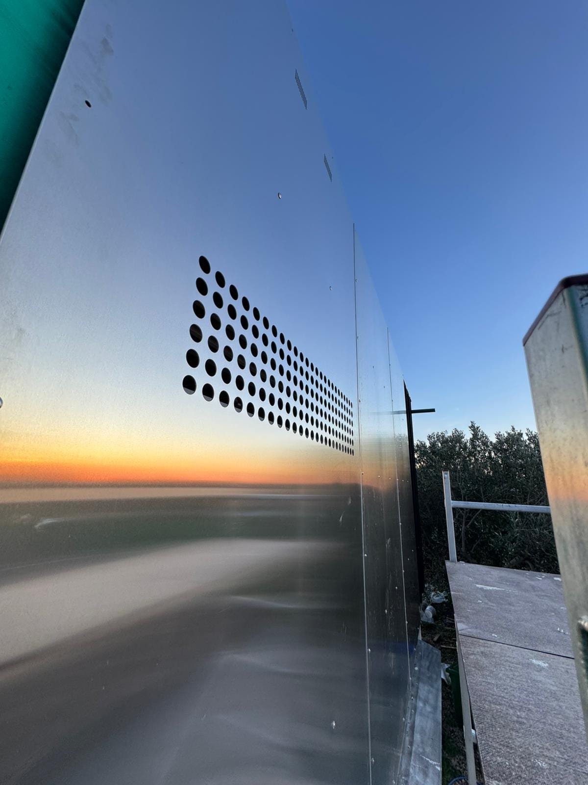 Kuća Lata s atelierom, Trogir — perforated façade at dusk